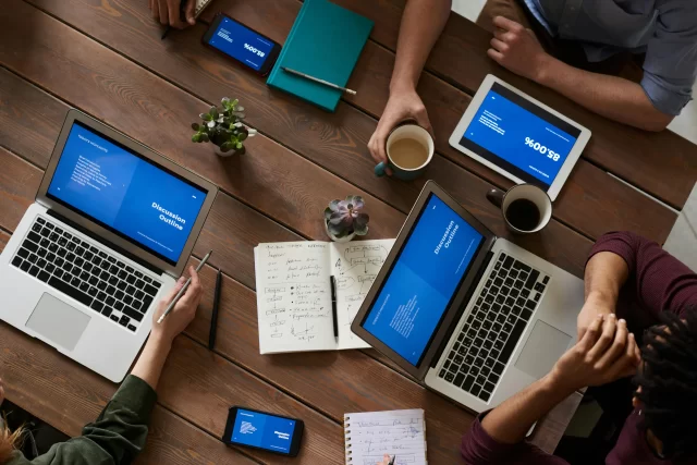A diverse team collaborating on a strategy, showcasing their approach to Google Cloud Computing in Switzerland.