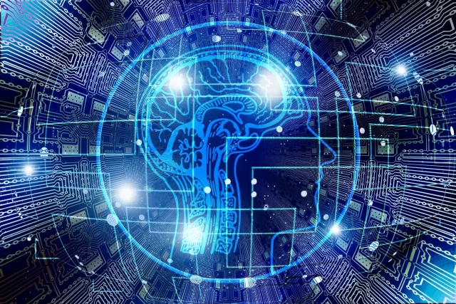 Digital representation of a human brain integrated into a circuit board, symbolizing AI and innovation in Swiss Cloud Computing.